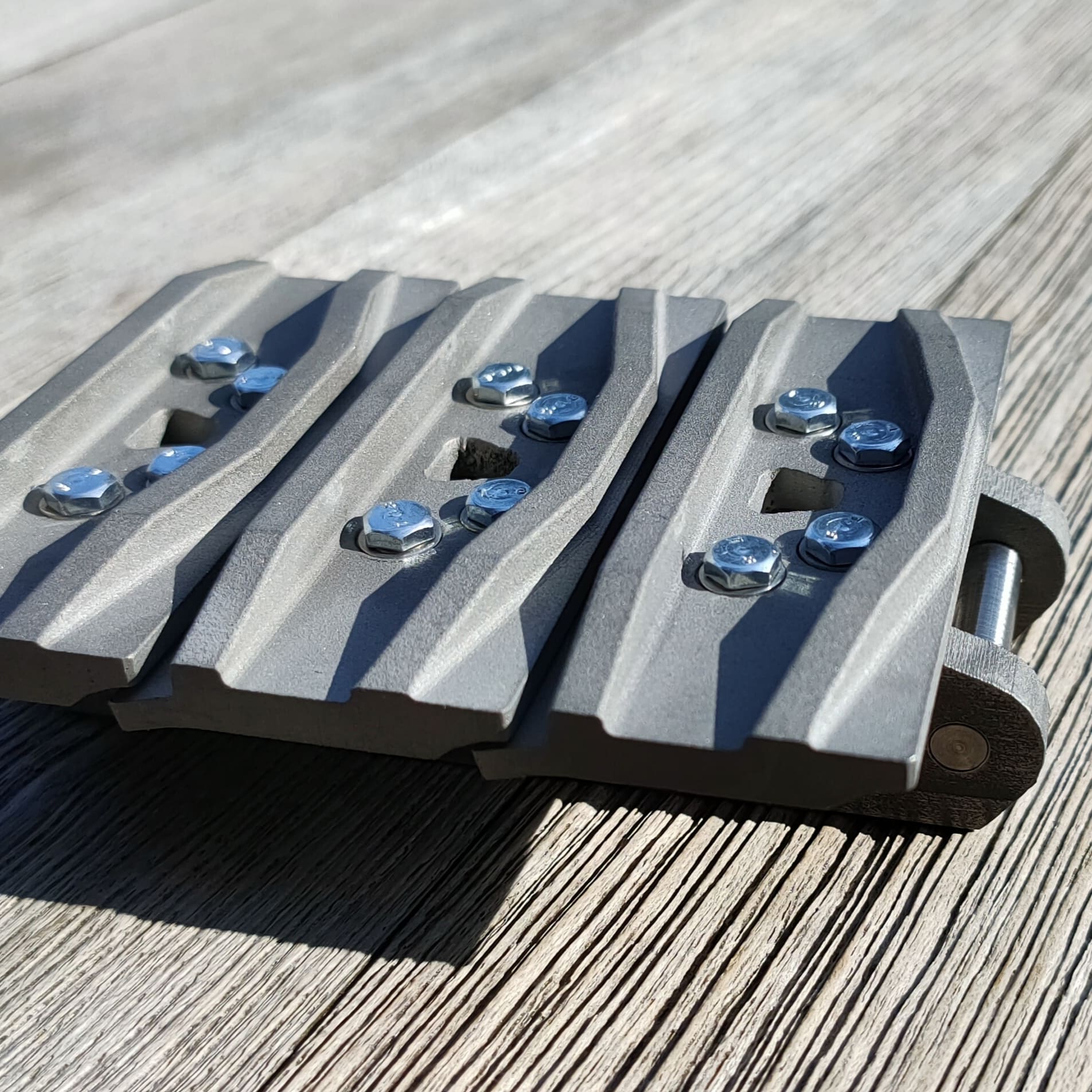 Chain assembly for a scale model excavator